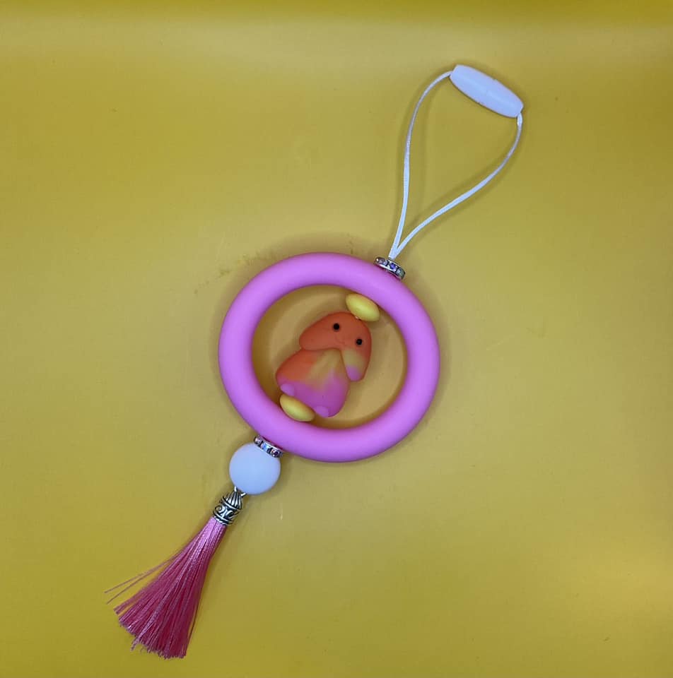 pink orange yellow car charm
